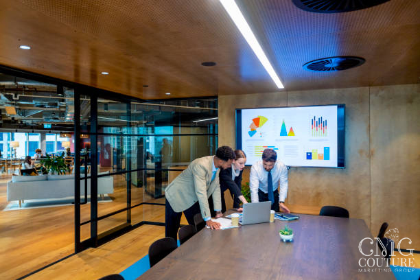 Marketing team reviewing campaign performance across digital channels